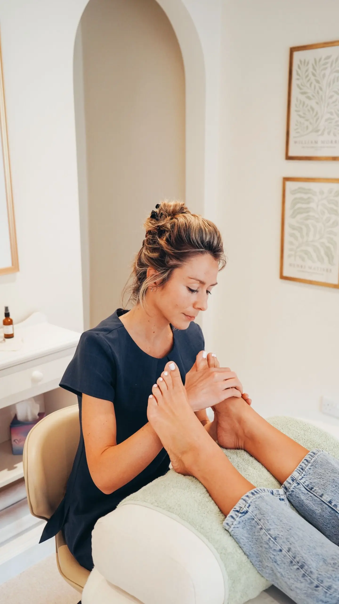 Ellie giving reflexology treatment